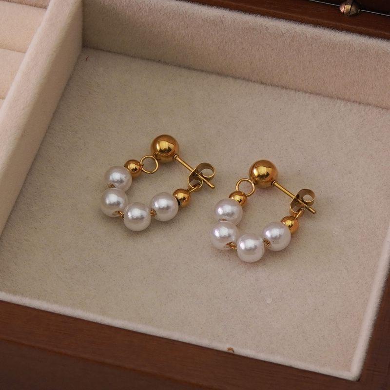 Pendiente Elegante con Perlas